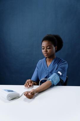 person having their blood pressure measured